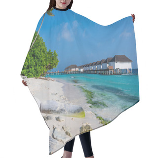 Personality  Sandy Beach With Stones And Forest. Above The Sea Is A Row Of Tropical Houses. Sunny Weather. Hair Cutting Cape