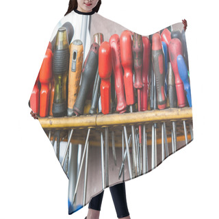 Personality  Assortment Of Tools Hanging On Wall. Screwdrivers In Mechanic Garage Car Service Hair Cutting Cape