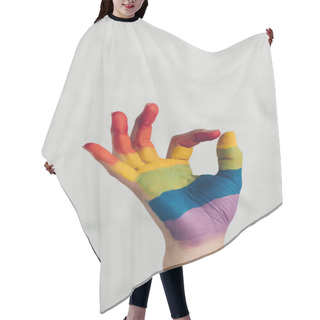 Personality  Cropped Shot Of Hand Painted In Colors Of Pride Flag Showing Okay Gesture In Front Of White Brick Wall Hair Cutting Cape