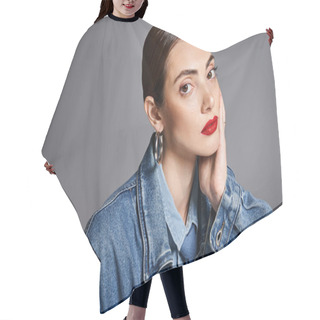 Personality  A Stylish Young Woman With Brunette Hair Wearing A Denim Jacket And Red Lipstick Exudes Confidence And Elegance. Hair Cutting Cape