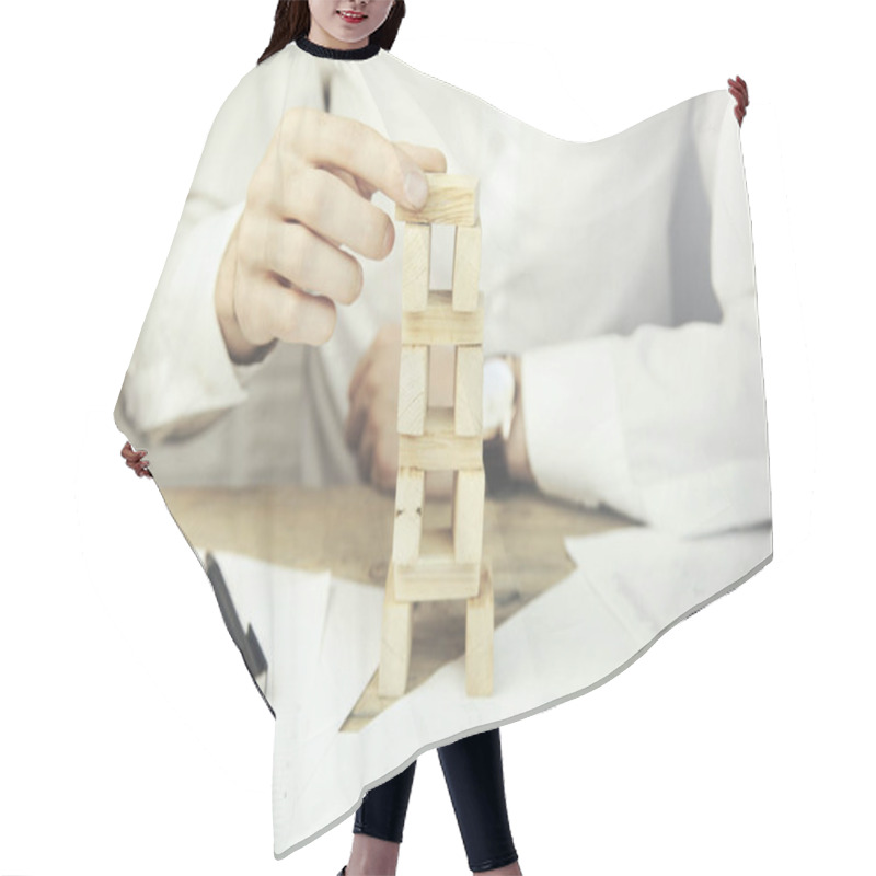 Personality  Businessman hand wooden cubes hair cutting cape