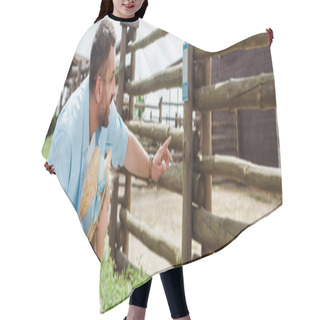 Personality  Panoramic Shot Of Happy Man Pointing With Finger Near Daughter In Straw Hat While Standing In Zoo  Hair Cutting Cape