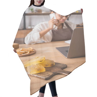 Personality  Selective Focus Of Homemade Soap Near Laptop And Blurred African American Woman Accepting Order On Smartphone Hair Cutting Cape