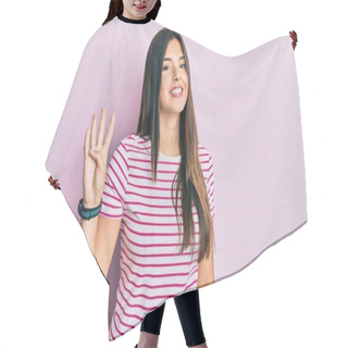 Personality  Young Brunette Woman Wearing Casual Clothes Over Pink Background Showing And Pointing Up With Fingers Number Four While Smiling Confident And Happy.  Hair Cutting Cape