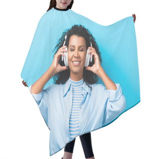Personality  Happy African American Woman Listening Music In Headphones On Blue Hair Cutting Cape