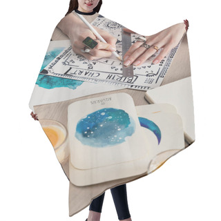 Personality  Selective Focus Of Fortuneteller Drawing Birth Chart By Cards With Watercolor Paintings And Candles On Table   Hair Cutting Cape