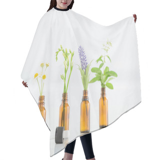 Personality  Chamomile, Freesia, Salvia And Hyacinth Flowers In Glass Bottles Near Dropper On White Background Hair Cutting Cape