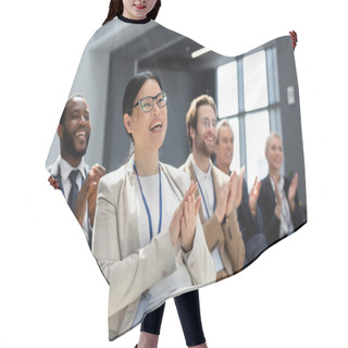 Personality  Asian Businesswoman Applauding During Seminar Near Blurred Interracial Colleagues Hair Cutting Cape