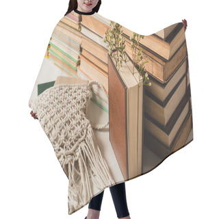 Personality  Wildflowers Near Pile Of Books With Hardcover And Knitted Crossbody Bag On White Hair Cutting Cape