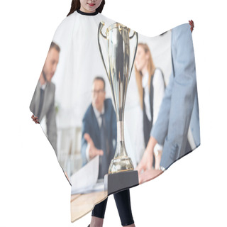 Personality  Champion Cup Standing In Office Hair Cutting Cape