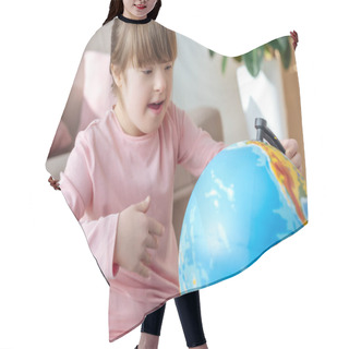 Personality  Child With Down Syndrome Looking At Globe Hair Cutting Cape