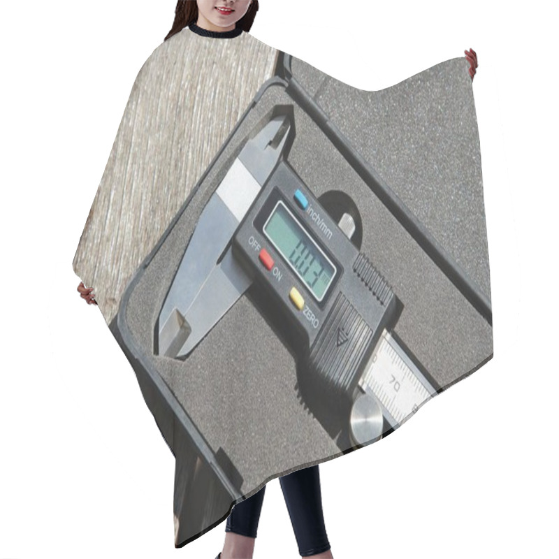 Personality  High Angle Shot Of A Digital Caliper In A Box On A Wooden Surface Hair Cutting Cape