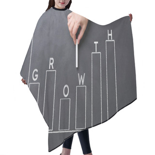 Personality  A Woman's Hand Points To A Graph With Growing Indicators Drawn On A Black Chalkboard. Hair Cutting Cape