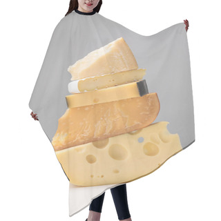 Personality  Close Up View Of Stack Of Different Types Of Cheese On Gray Hair Cutting Cape