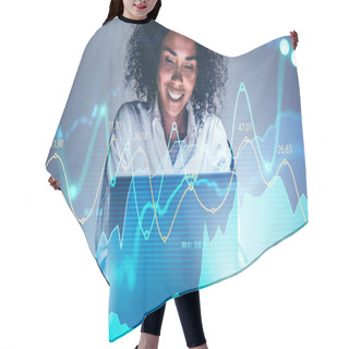 Personality  Cheerful Young African American Woman Using Laptop At Blurry Table With Double Exposure Of Financial Graph. Concept Of Trading And Financial Success. Toned Image Hair Cutting Cape