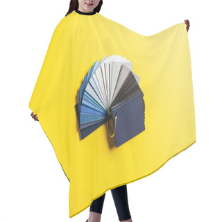 Personality  Top View Of Palette With Blue, Grey And Black Colors On Yellow Hair Cutting Cape