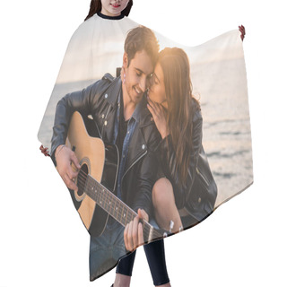 Personality  Young Woman Kissing Boyfriend Playing Acoustic Guitar On Seaside During Sunset  Hair Cutting Cape