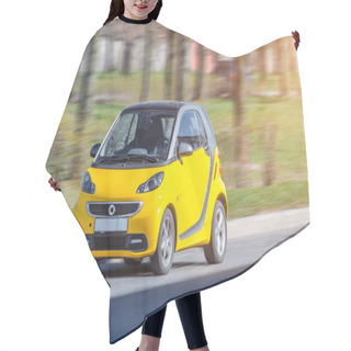 Personality  Miniature Small City Smart Car Of Yellow Color. Russia, Saint-Petersburg, May 2017. Hair Cutting Cape