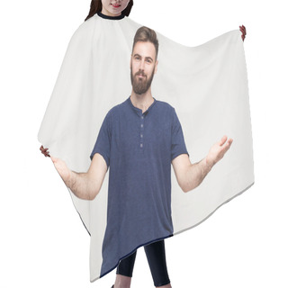 Personality  Please, Take For Free. Kind Generous Man In Dark T-shirt Outstretching Hands As If Giving For Free, Offering To Embrace, Inviting With Hospitable Expression. Indoor Shot Isolated On Gray Background. Hair Cutting Cape