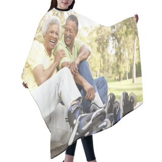 Personality  Senior Couple Putting On In Line Skates In Park Hair Cutting Cape