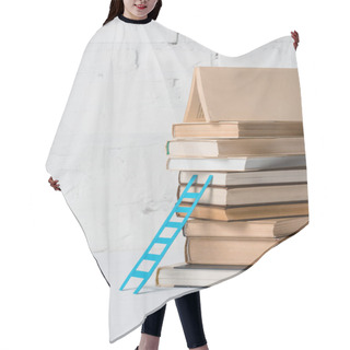 Personality  Pile Of Books And Small Blue Step Ladder Near White Brick Wall Hair Cutting Cape