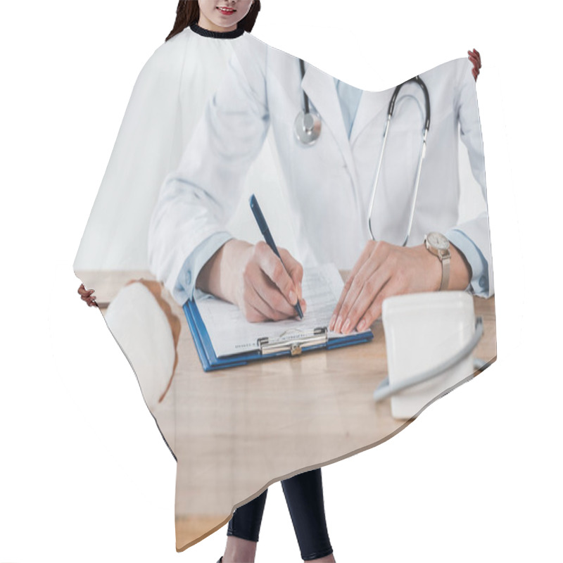 Personality  Cropped View Of Patient With Broken Arm Near Doctor Writing On Clipboard  Hair Cutting Cape