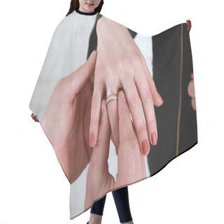 Personality  Grooms Hand Putting A Wedding Ring On The Brides Finger.Wedding Hair Cutting Cape