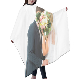 Personality  Bride And Groom Hugging While Hiding Faces Behind Wedding Bouquet Isolated On White Hair Cutting Cape