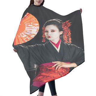Personality  Beautiful Geisha In Black Kimono With Red Flowers In Hair Posing With Traditional Hand Fan Isolated On Black Hair Cutting Cape