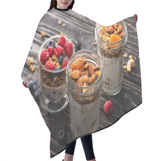 Personality  Delicious Granola With Berries, Dried Apricots, Nuts And Yogurt In Glass Cups On Wooden Surface Hair Cutting Cape