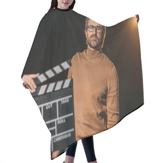 Personality  Selective Focus Of Mature Actor With Clapboard In Front  Hair Cutting Cape