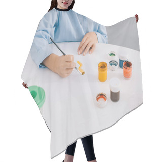 Personality  Partial View Of Child Drawing Picture With Paints And Paint Brush At Table Hair Cutting Cape