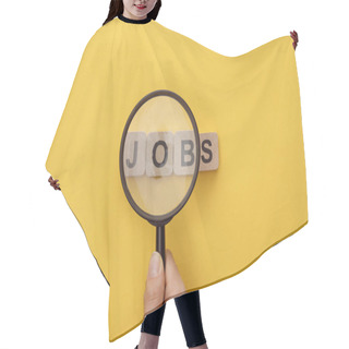 Personality  Cropped View Of Woman Holding Magnifying Glass Under Cardboard Squares With Jobs Lettering On Yellow Background Hair Cutting Cape