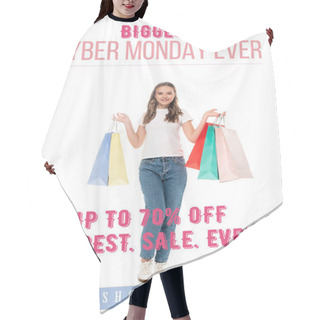 Personality  Joyful Young Woman Holding Colorful Shopping Bags And Looking At Camera Near Biggest Cyber Monday Ever Lettering On White Hair Cutting Cape