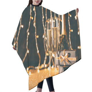 Personality  Two Glasses Of Champagne, Presents And Bottle On Garland Light Background, Christmas Concept Hair Cutting Cape