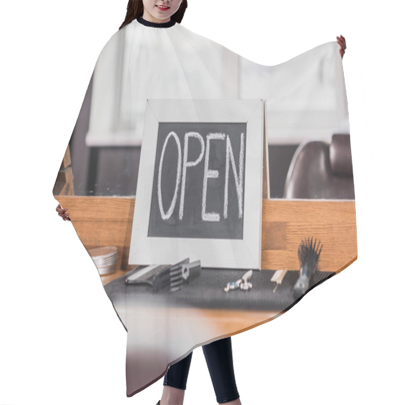Personality  Blackboard With Open Sign Leaning On Mirror At Barbershop With Tools On Rubber Mat And On Counter Hair Cutting Cape
