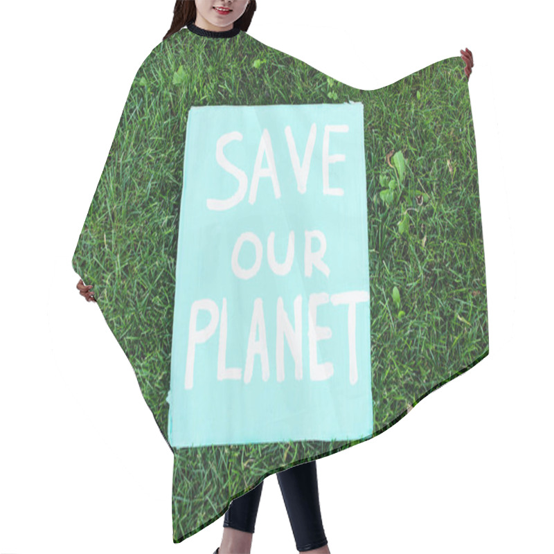 Personality  Top view of save our planet lettering on placard on green grass, ecology concept hair cutting cape
