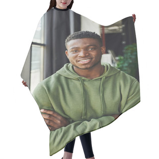 Personality  Youthful And Charismatic African American Entrepreneur In Green And Trendy Hoodie Standing With Folded Arms And Smiling At Camera, Happy Emotion, Contemporary Office Space  Hair Cutting Cape