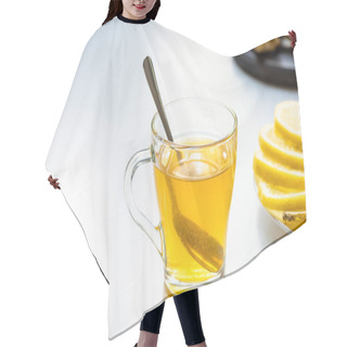 Personality  Selective Focus Of Hot Tea In Glass Cup With Spoon Near Lemon Slices On White Background Hair Cutting Cape