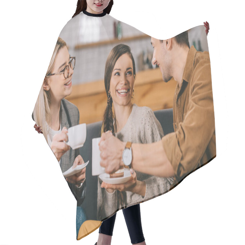 Personality  cheerful friends chatting while holding cups in cafe hair cutting cape