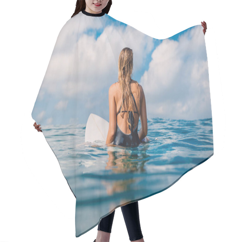 Personality  Surfer Woman Sitting On Surfboard In Ocean With Island On Background  Hair Cutting Cape