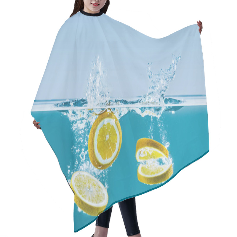 Personality  lemon slices falling into water with splashes hair cutting cape