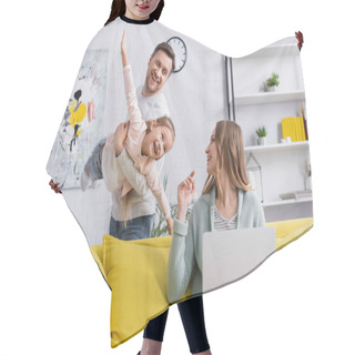 Personality  Smiling Mother With Laptop Looking At Family Having Fun At Home  Hair Cutting Cape
