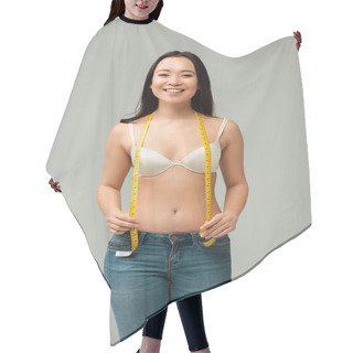 Personality  Cheerful And Overweight Asian Girl Holding Measuring Tape Isolated On Grey  Hair Cutting Cape