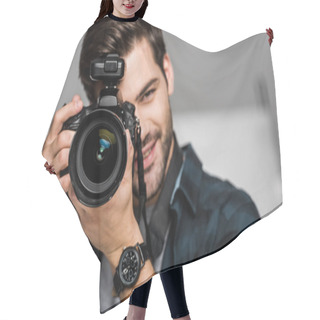 Personality  Smiling Young Man Photographing With Camera In Studio  Hair Cutting Cape