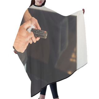 Personality  Cropped View Of Man Holding Bottle With Antibacterial Liquid Near Remote Controller  Hair Cutting Cape