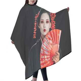 Personality  Attractive Geisha In Black Kimono With Flowers In Hair Holding Bright Hand Fan Isolated On Black With Copy Space Hair Cutting Cape