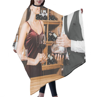 Personality  Cropped Shot Of Wine Steward Holding Decanter Of Wine In Front Of Female Client At Wine Store Hair Cutting Cape