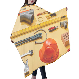 Personality  High Angle View Of Industrial Tools, Helmet, Bricks, Measuring Tape, Brush, And Plumbing Hose On Yellow Background Hair Cutting Cape