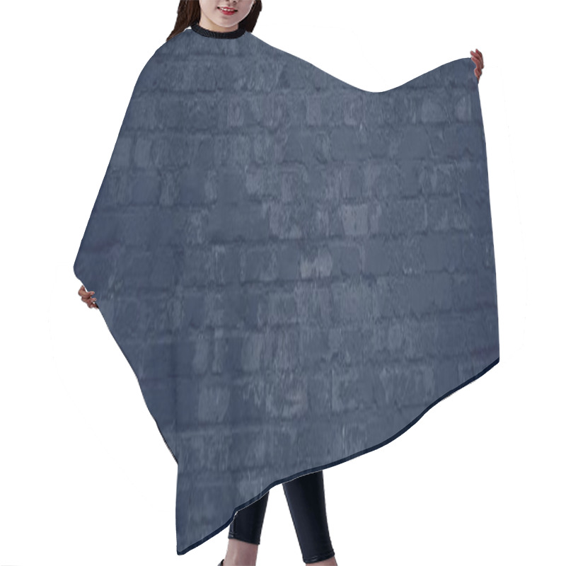 Personality  dirty old stone wall of dark blue stones hair cutting cape